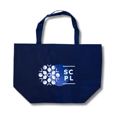 A navy blue fabric bag with a white library logo on the front.