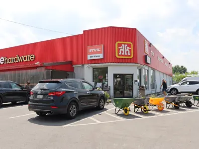 The front exterior and parking lot of Home Hardware.