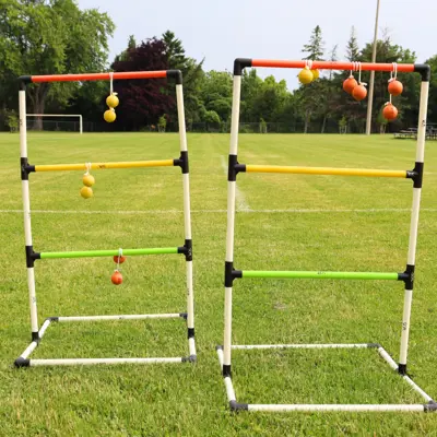 Ladder toss equipment set up in a field.