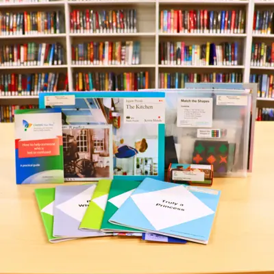 Display of all items in the "Interesting People" Memory Care Kit.