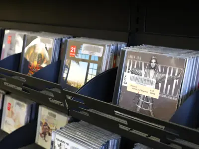 CDs on the shelf at the library.