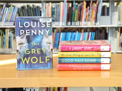 Books stacked on a table in the library.