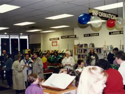 People of all ages gathered inside the Merritt branch in 1986 for a grand opening party.