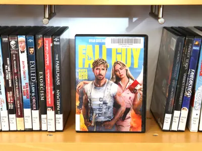 DVDs on the shelf at the library.
